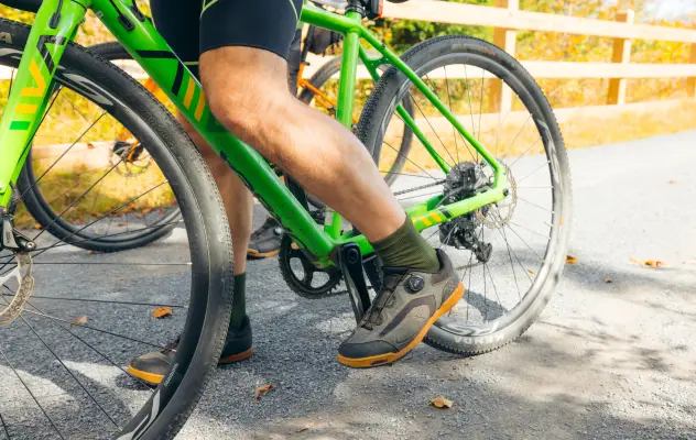 A close up of someone riding a bicycle.