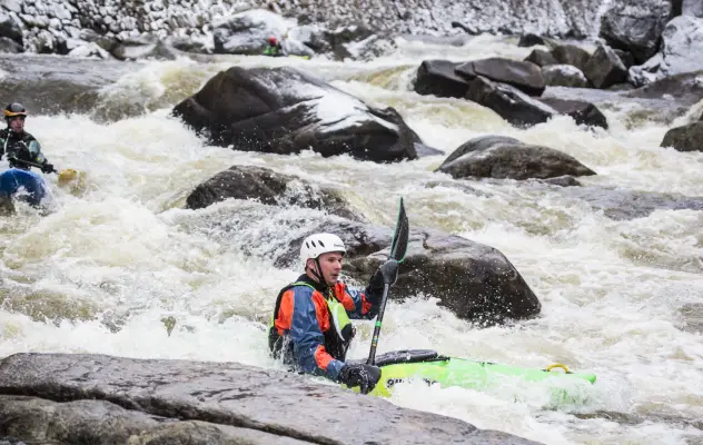 Rafting in whitewater.