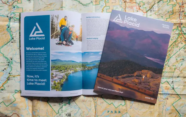 An open spread of a regional guide for Lake Placid.