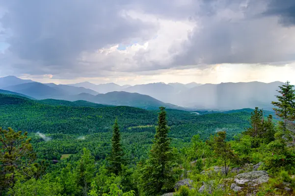 The view of rain showers from Big Crow Mountain.