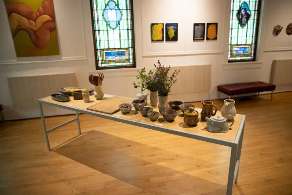 A table with pottery at an art gallery in Lake Placid.