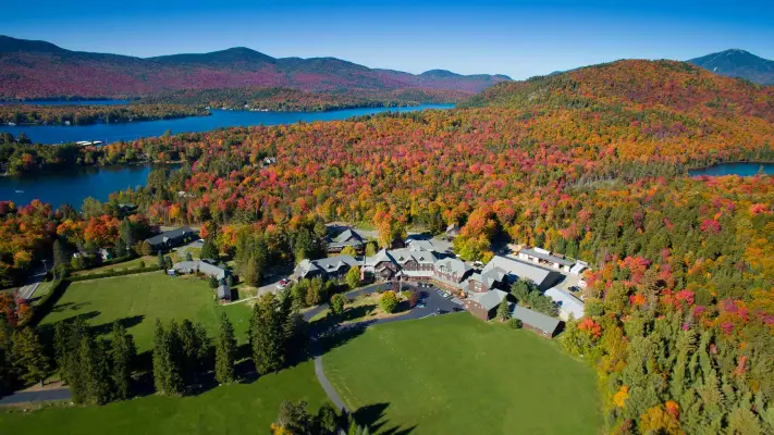 A school in the middle of colorful foliage. 
