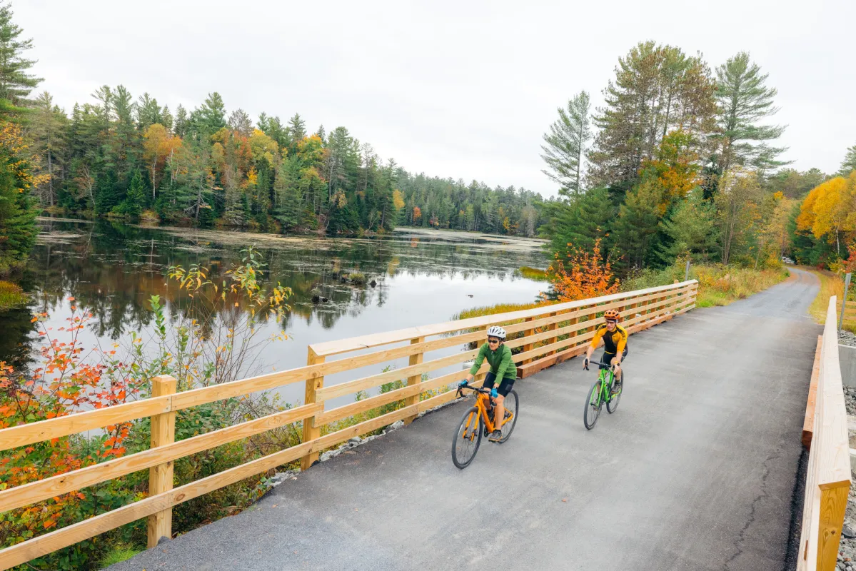 A couple cyclists on the Adirondack Rail Trail.