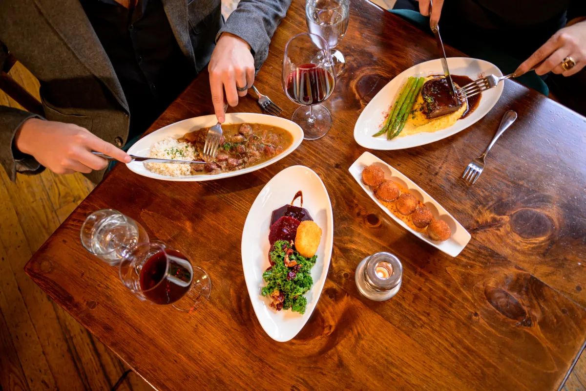 An aerial view of a table with plated food.