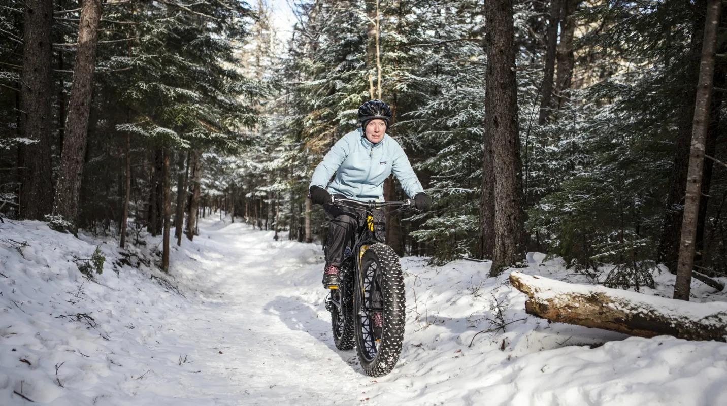 Fat tire biker in Lake Placid in the forest