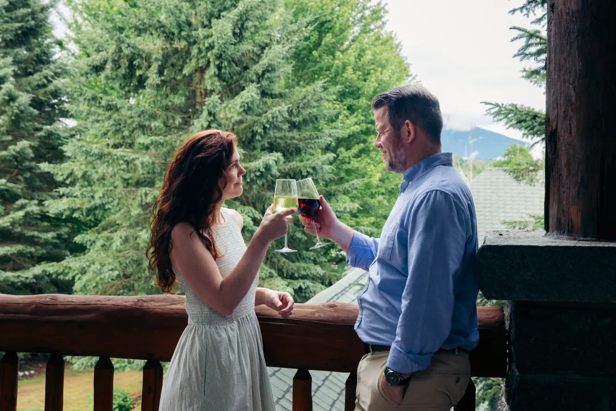 A couple drinking wine.