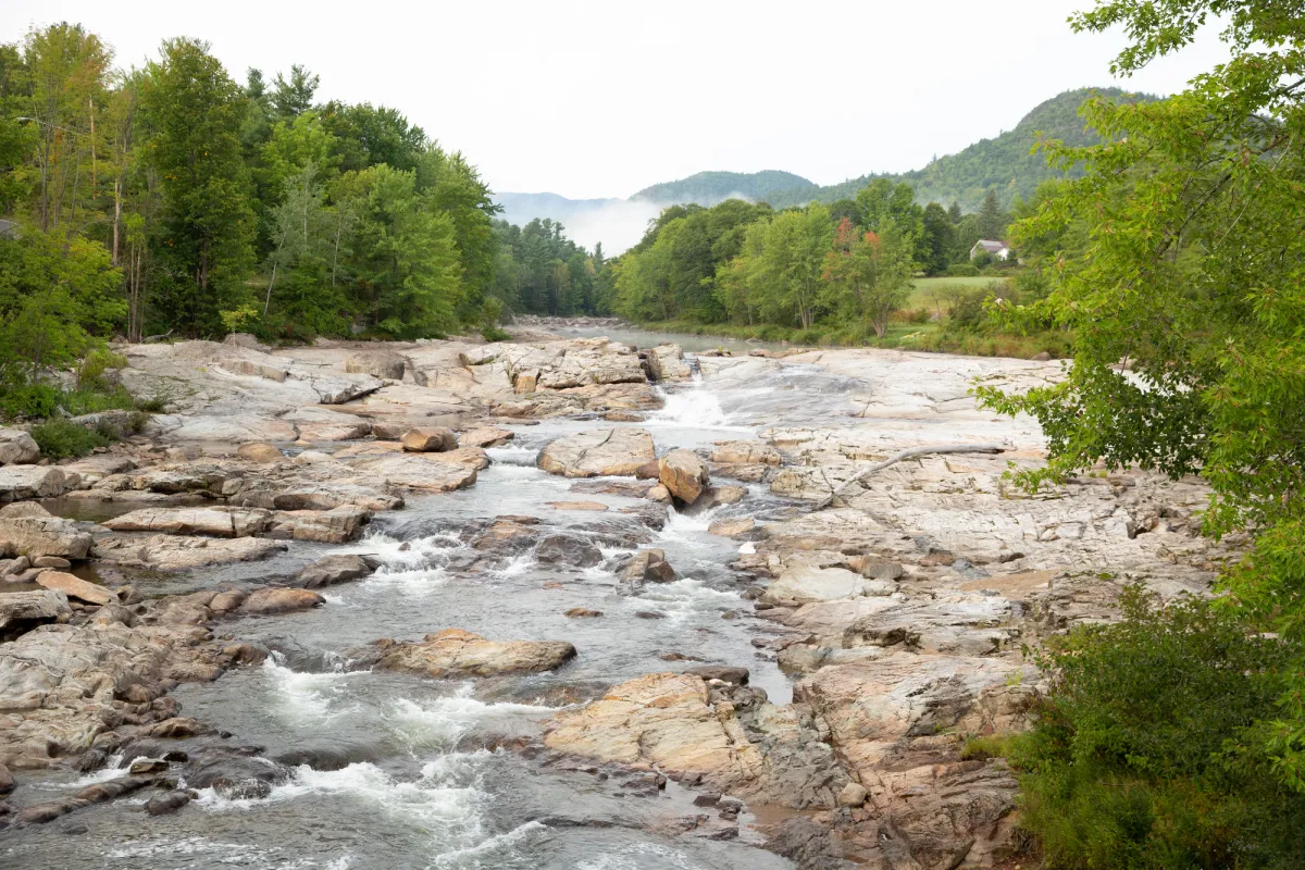 The view of the shallow rapids at Jay Covered Bridge.