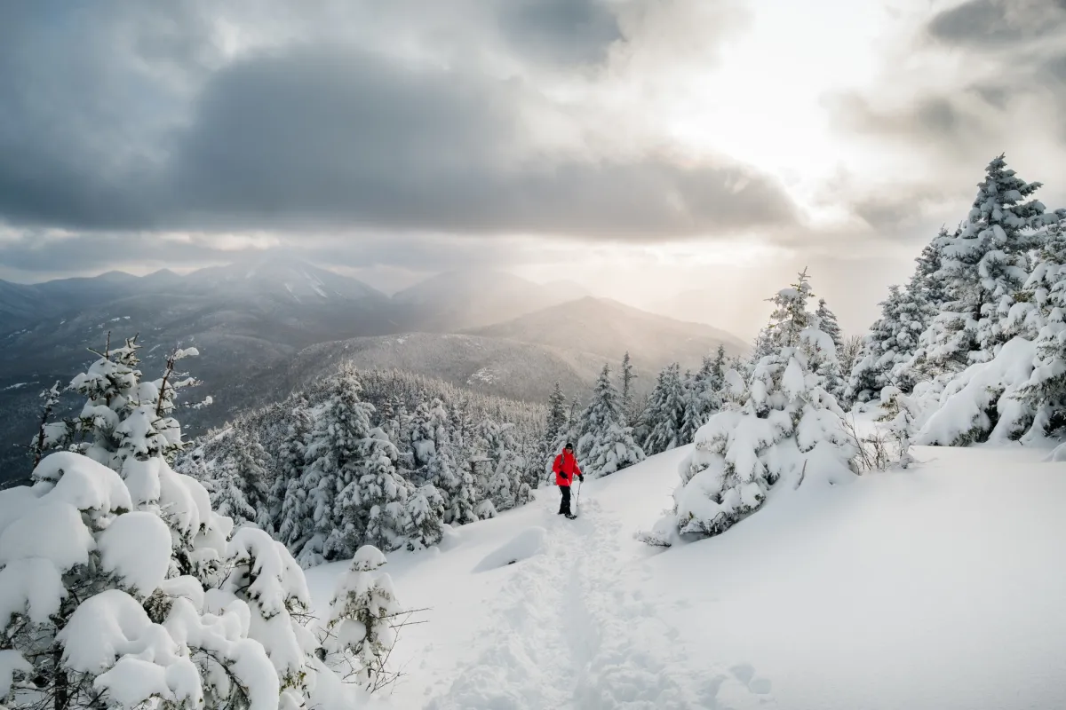 A snowshoer in the High Peaks