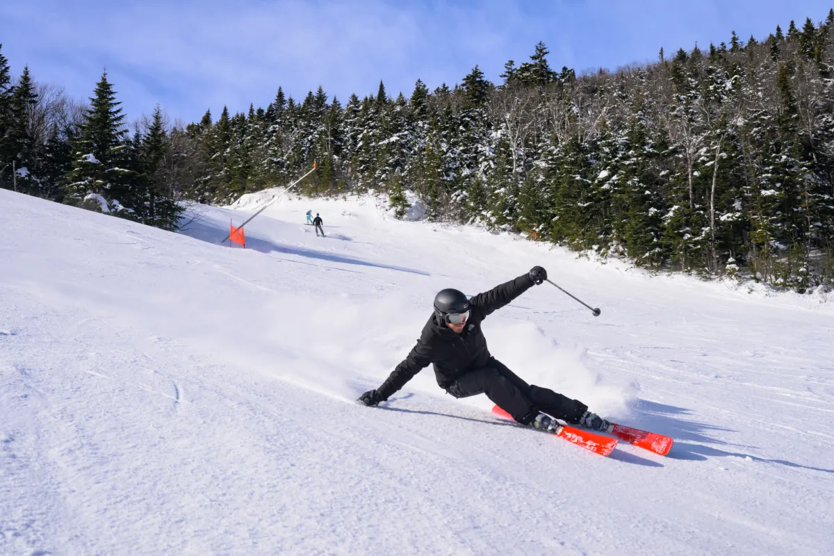 A skier going downhill at Whiteface Mountain.