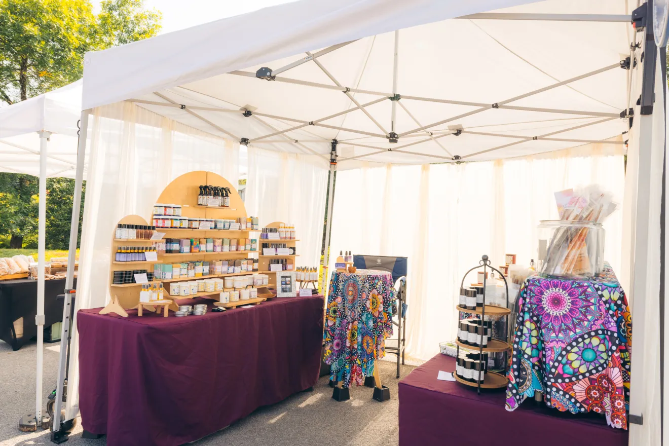 A jewelry stand at a farmers market.
