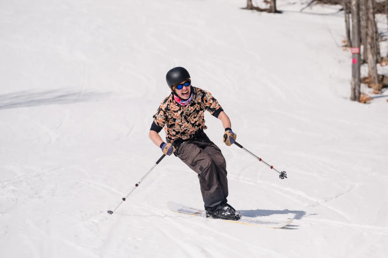 A person spring skiing at Whiteface Mountain.