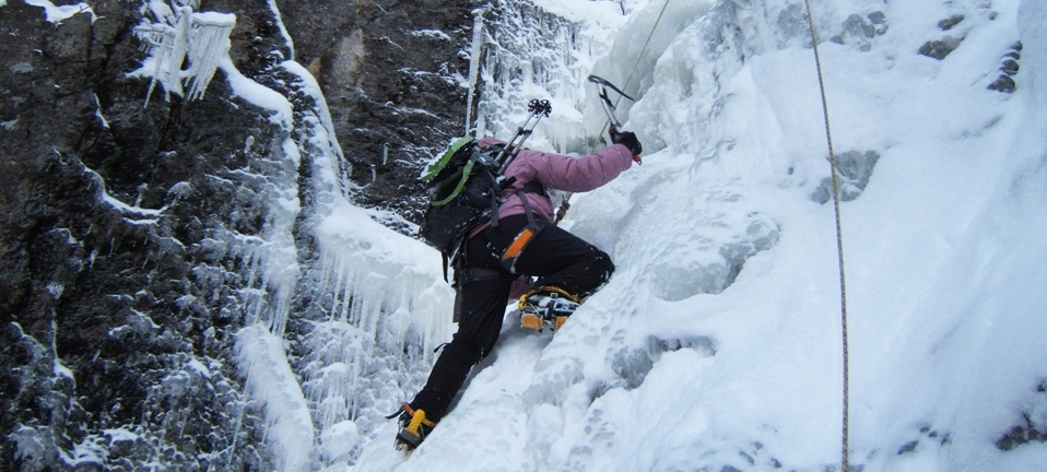 An ice climber in a gully