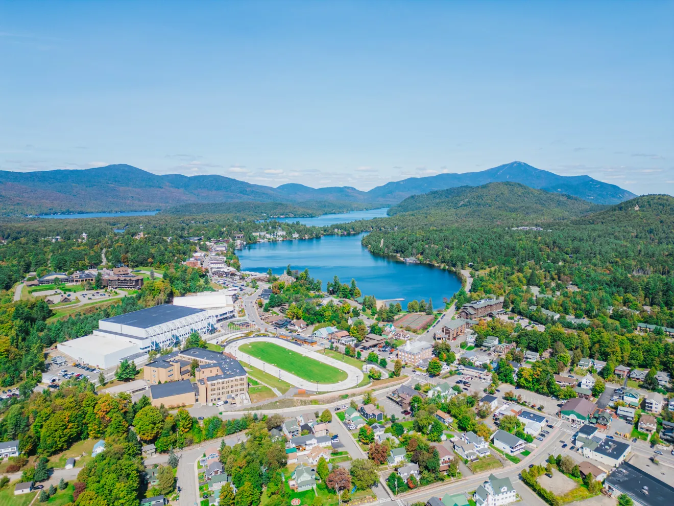 the center of Lake Placid with a lake and mountains. 