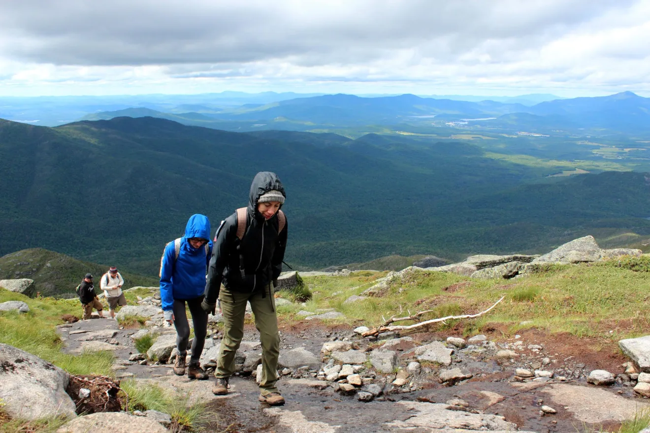 A couple hikers above treeline on Alqonguin