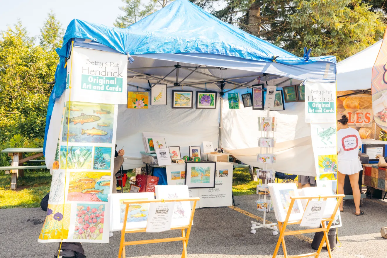 An artist's tent at a Lake Placid farmers market