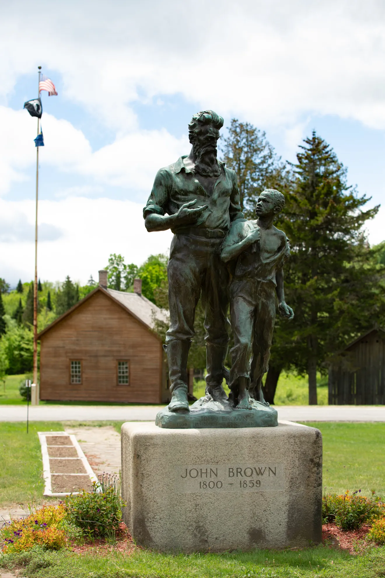 A statue of John Brown and a young boy. 