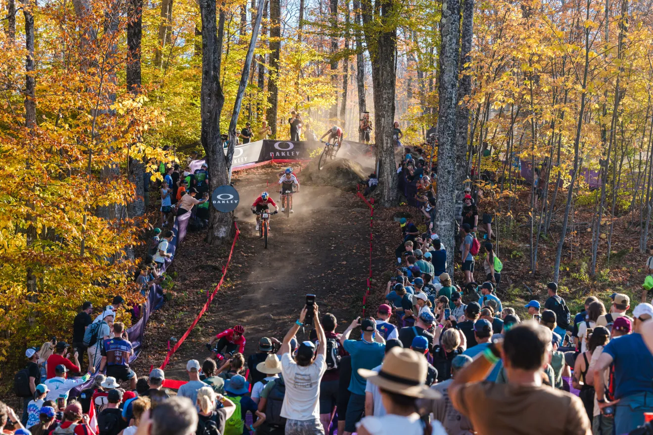 Large crowd of spectators line the course at the WHOOP UCI MTB Cross-Country World Cup race at Mt Van Hoevenberg in October