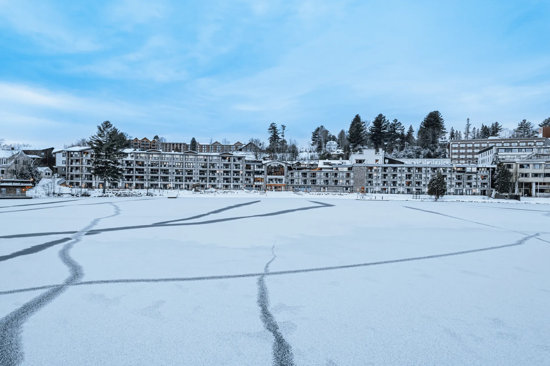 A view of all the rooms with lake views from the top of a frozen Mirror Lake.