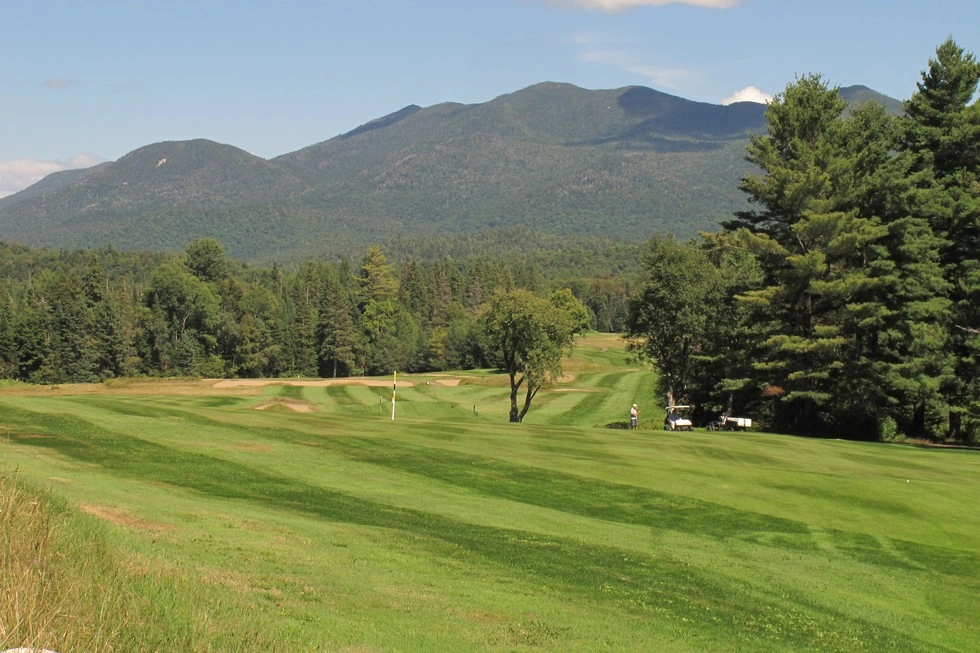 A gold course with mountain views