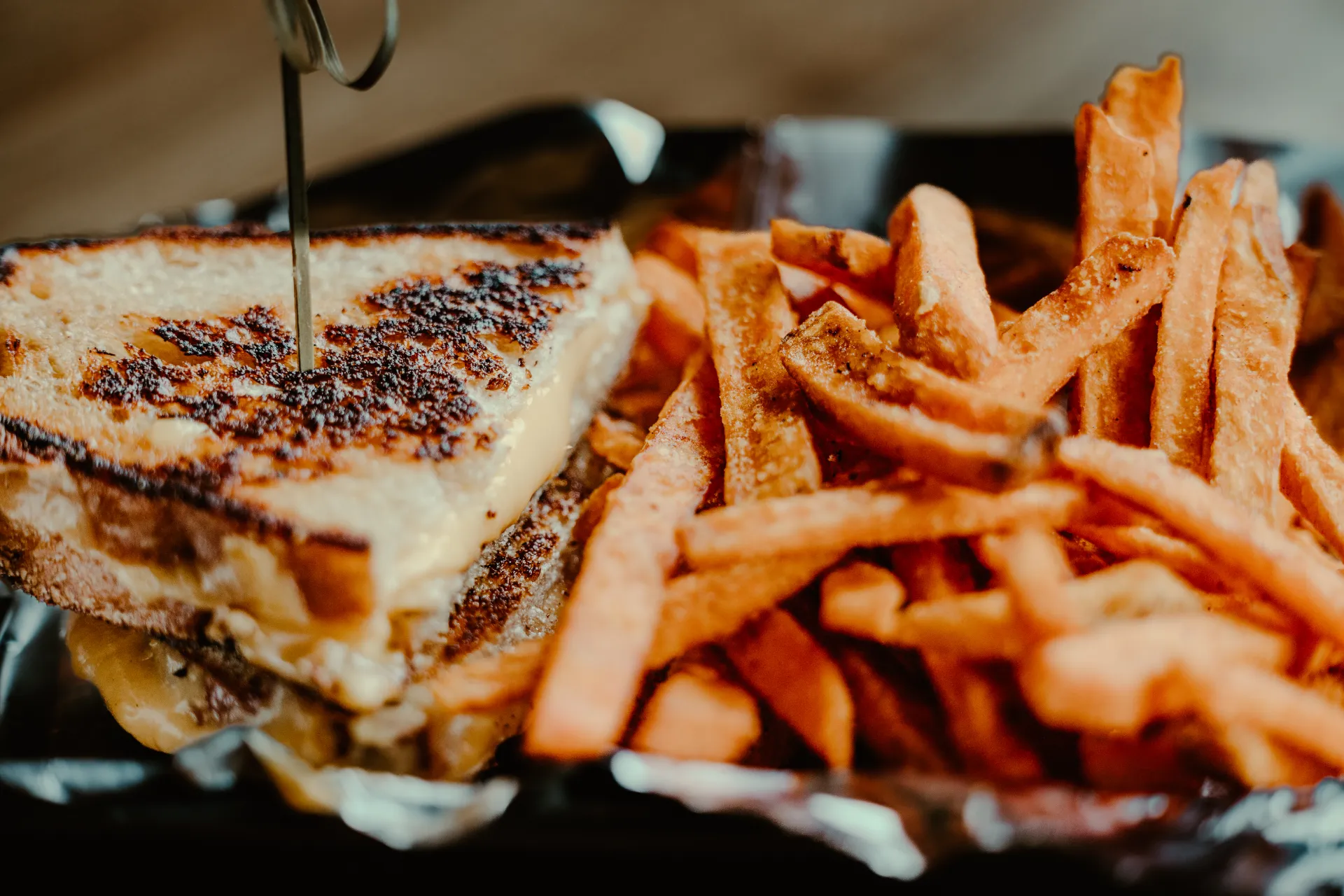 A perfectly grilled cheese and potato fries.  Photo Credit to A. Kelly.