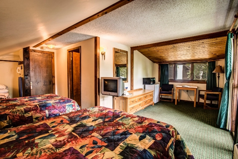 Colorful bedding in a room.