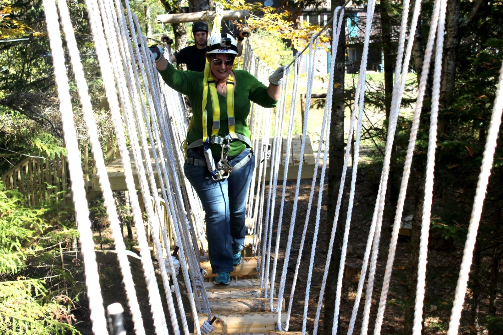 Jess takes the first bridge one wobbly step at a time.