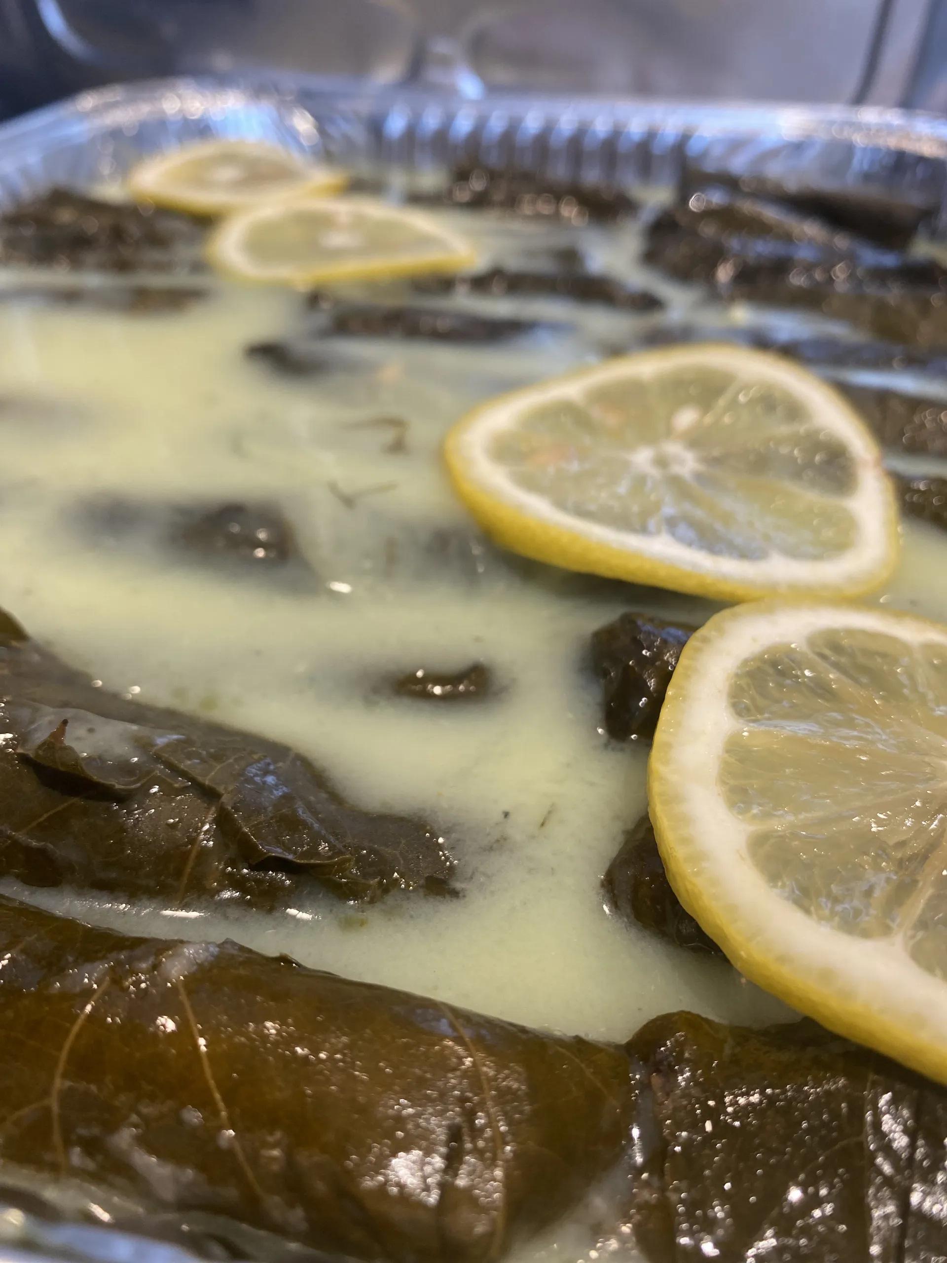 Warm Stuffed Grape Leaves with Egg Lemon Broth