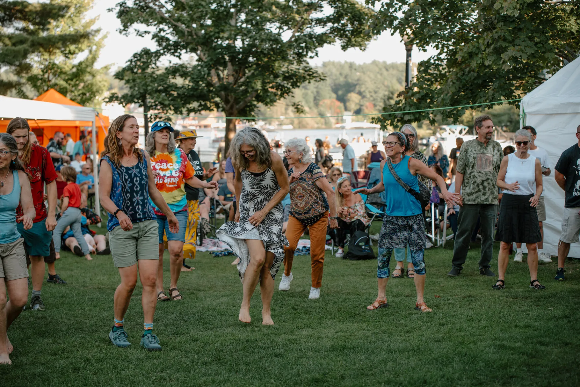 People dance and sway to the music