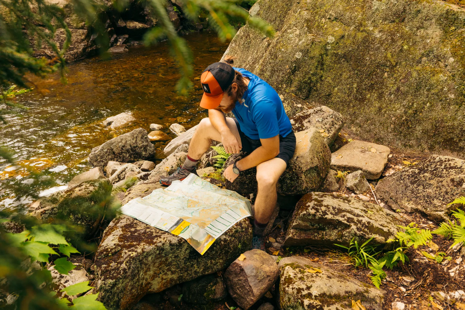 A hiker looking at a map