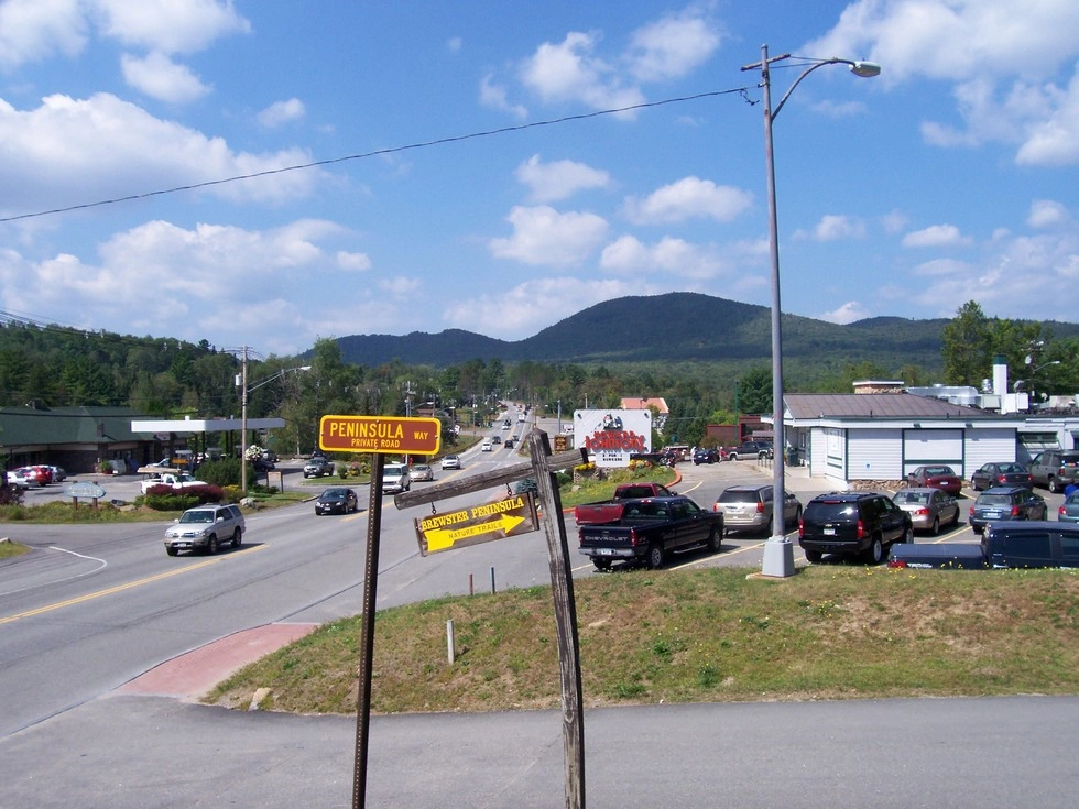 Coming from downtown on Route 86 West, the sign for the drive.