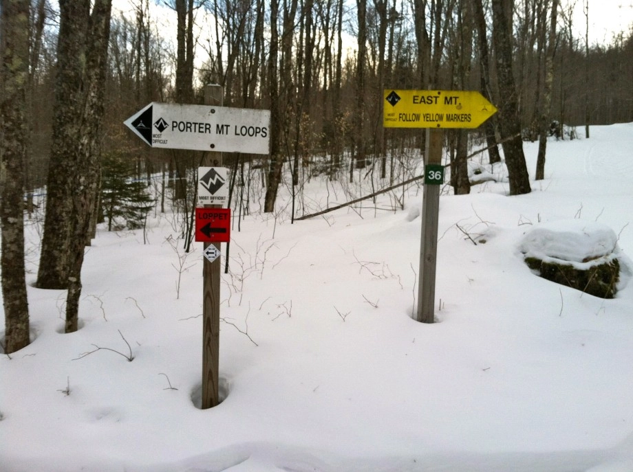 Trail sign indicating the beginning of the Porter Mountain Loops