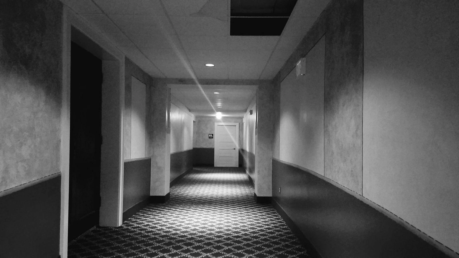 The hallway to Theater Four with the bathroom door that George opened straight ahead!