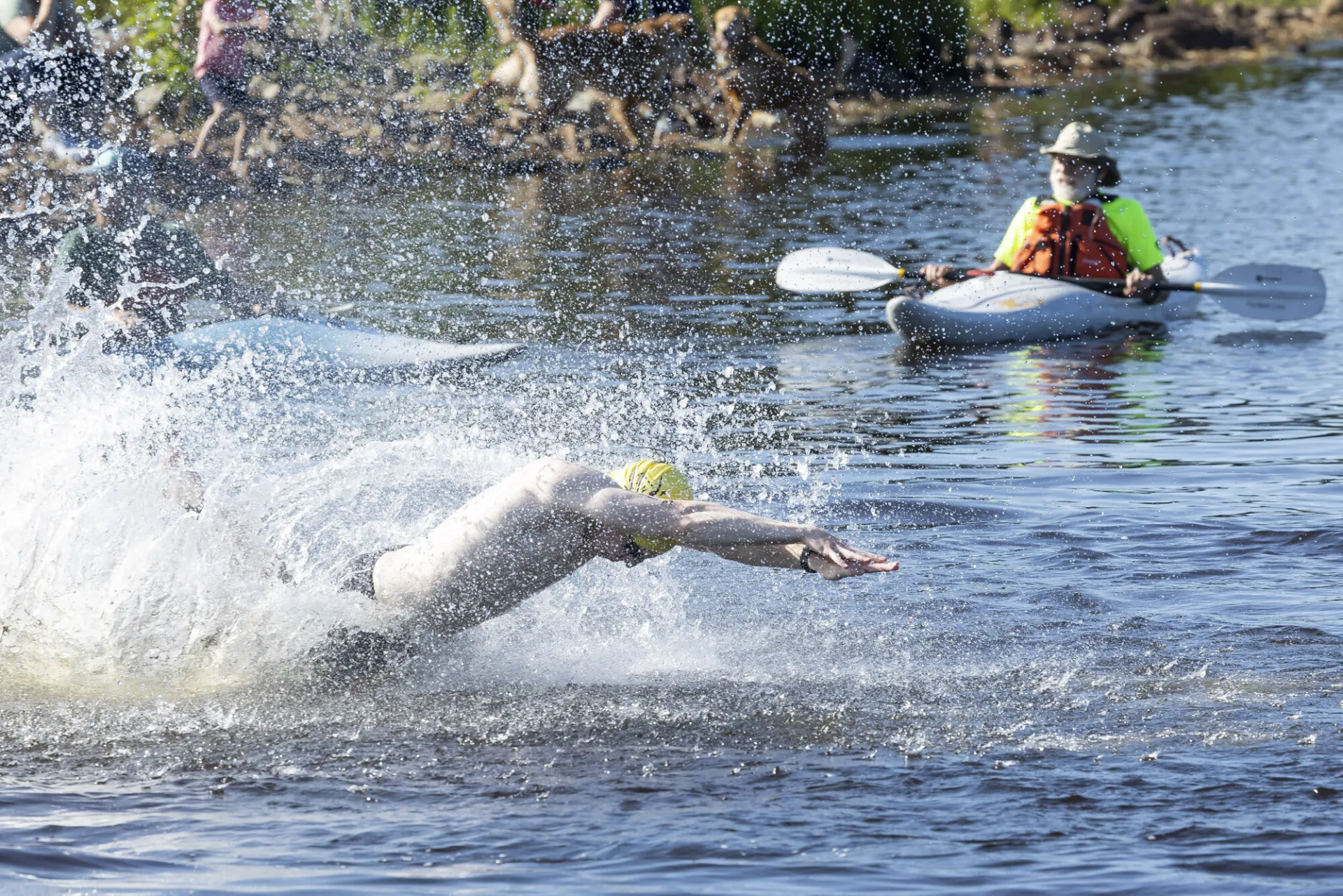 Tinman athlete dives into Raquette Pond