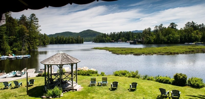 Chairs on the lawn by the lake.