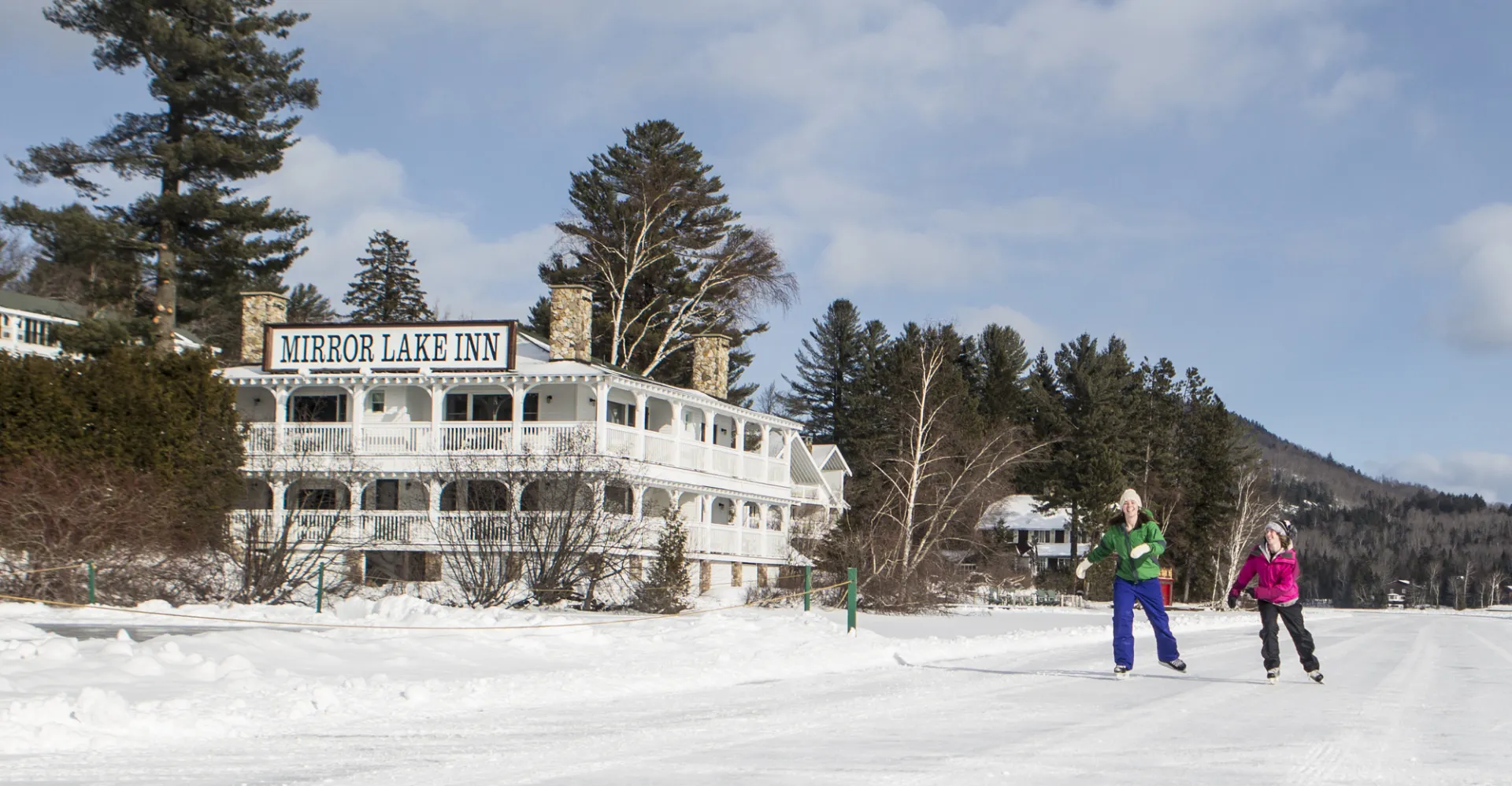 Skating on Mirror Lake in from of the Mirror Lake Inn