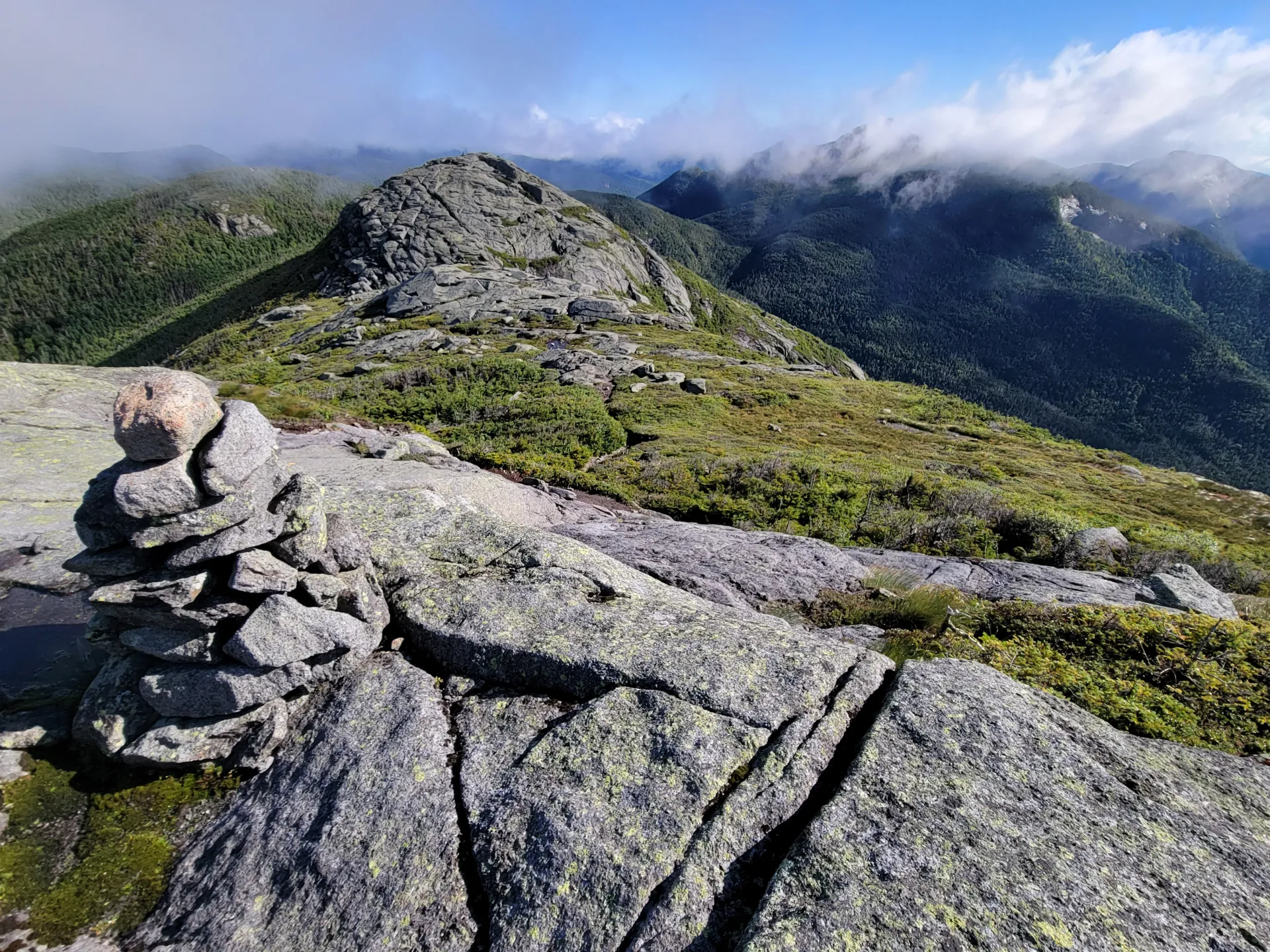 A smaller rocky sub summit below