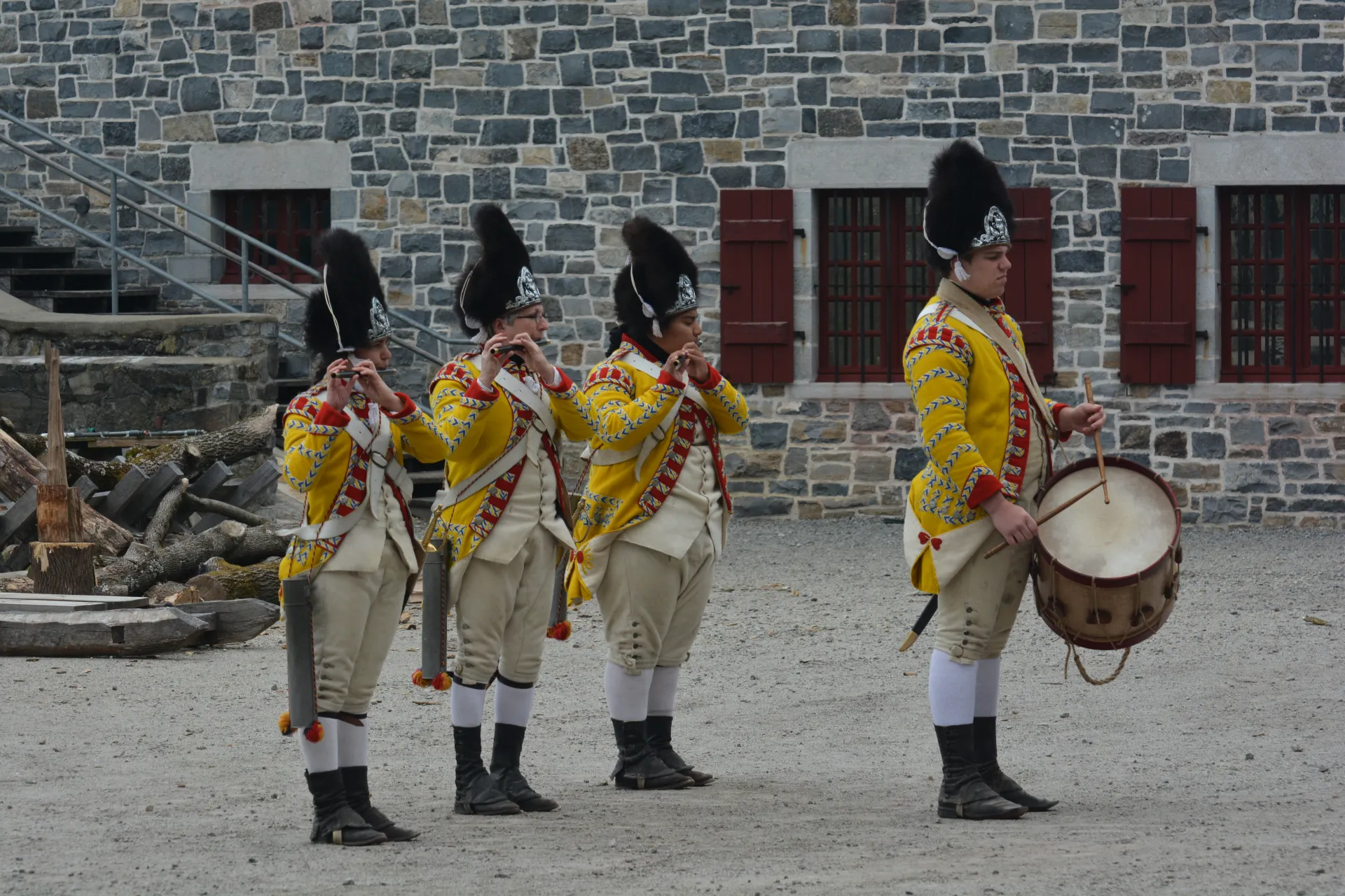 Reenactment of the music that would be played by the soldiers all dressed in yellow coats with tall fur hats.