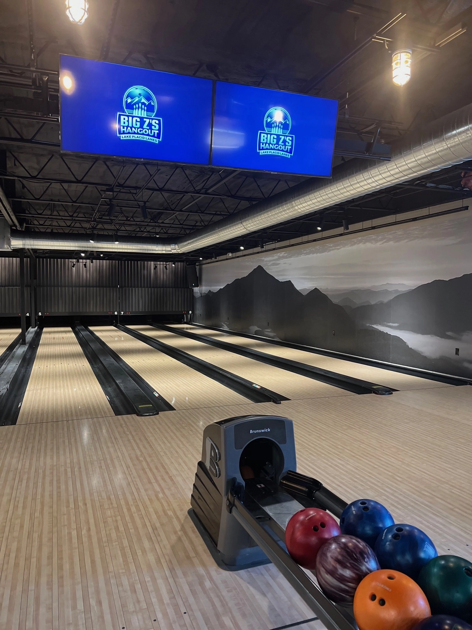 The new lanes for bowling with the futuristic pins on strings