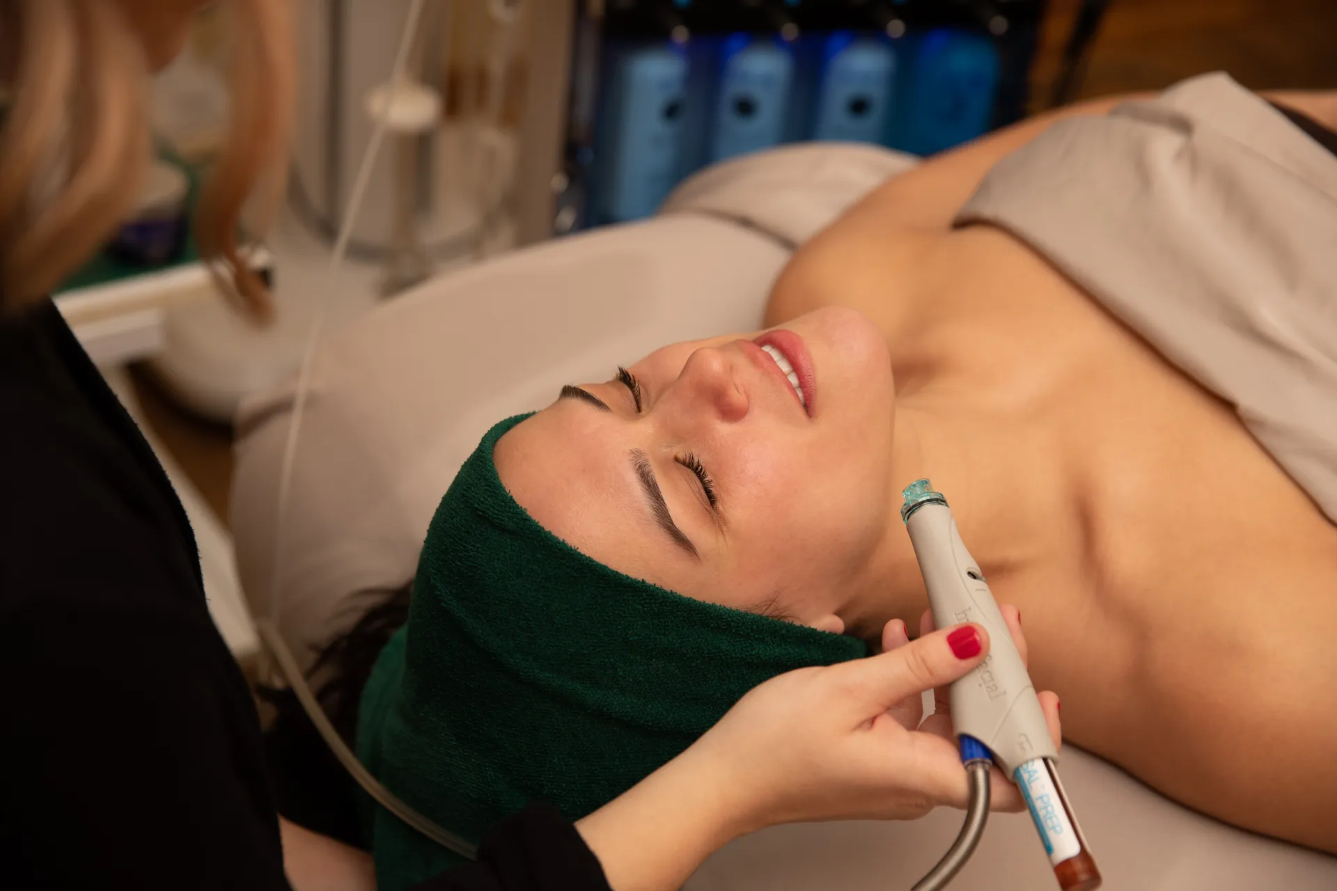 A woman enjoys a relaxing spa treatment.