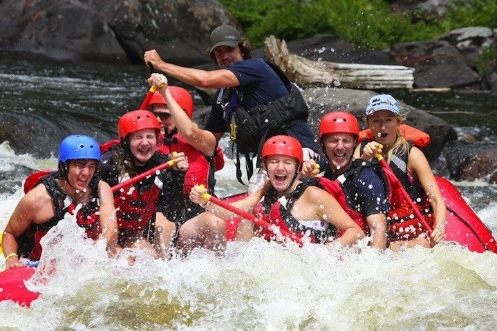 Smiling faces as the raft sinks