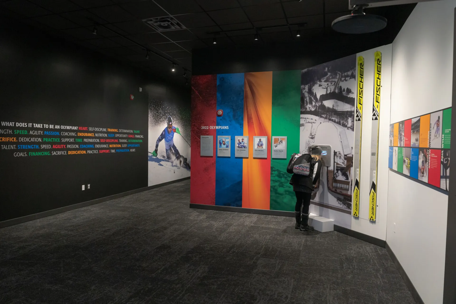 The colorful entry to the Lake Placid Olympic Museum with descriptions and images from floor to ceiling