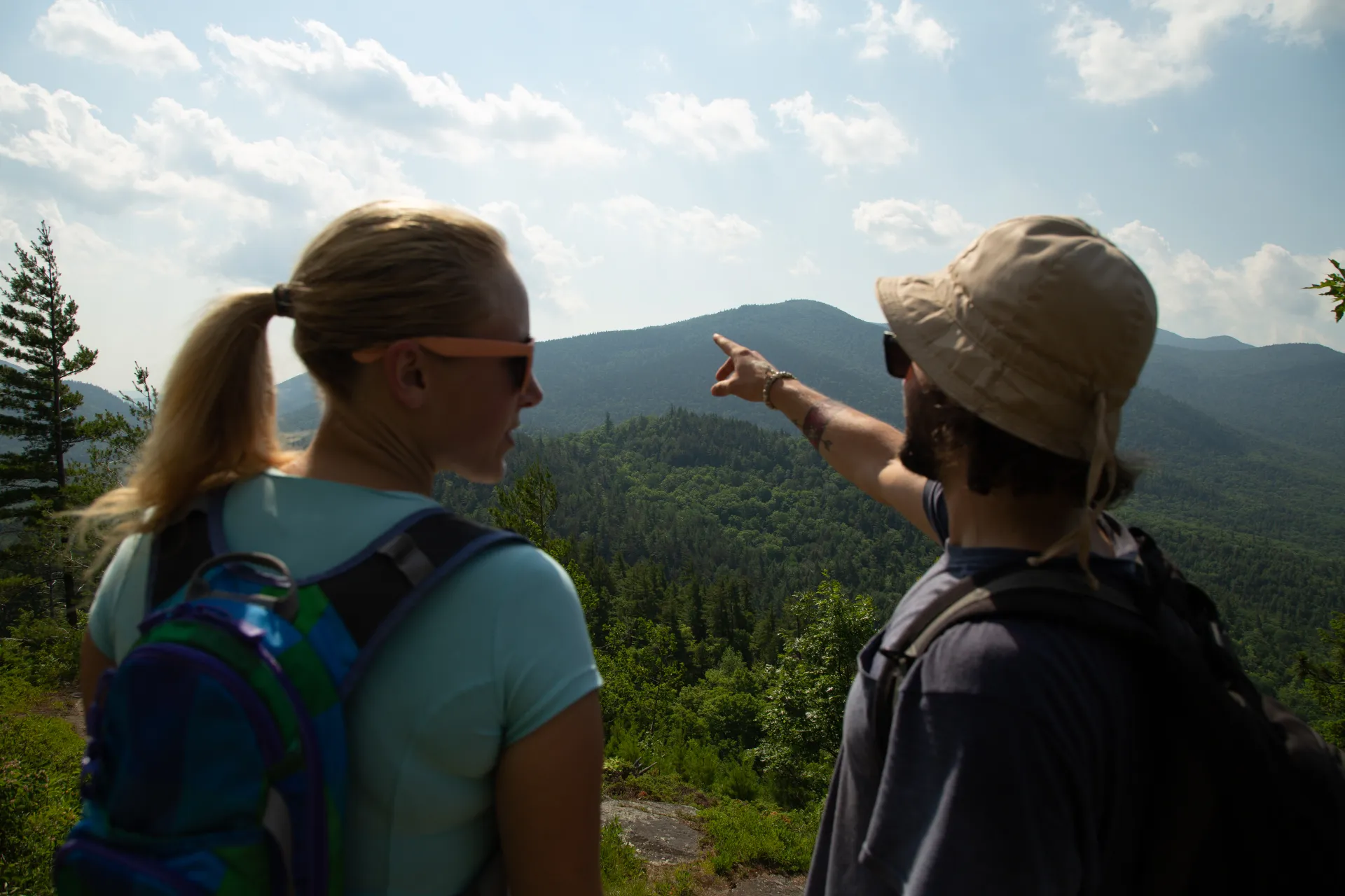 There are several mountains in the backdrop of the views.