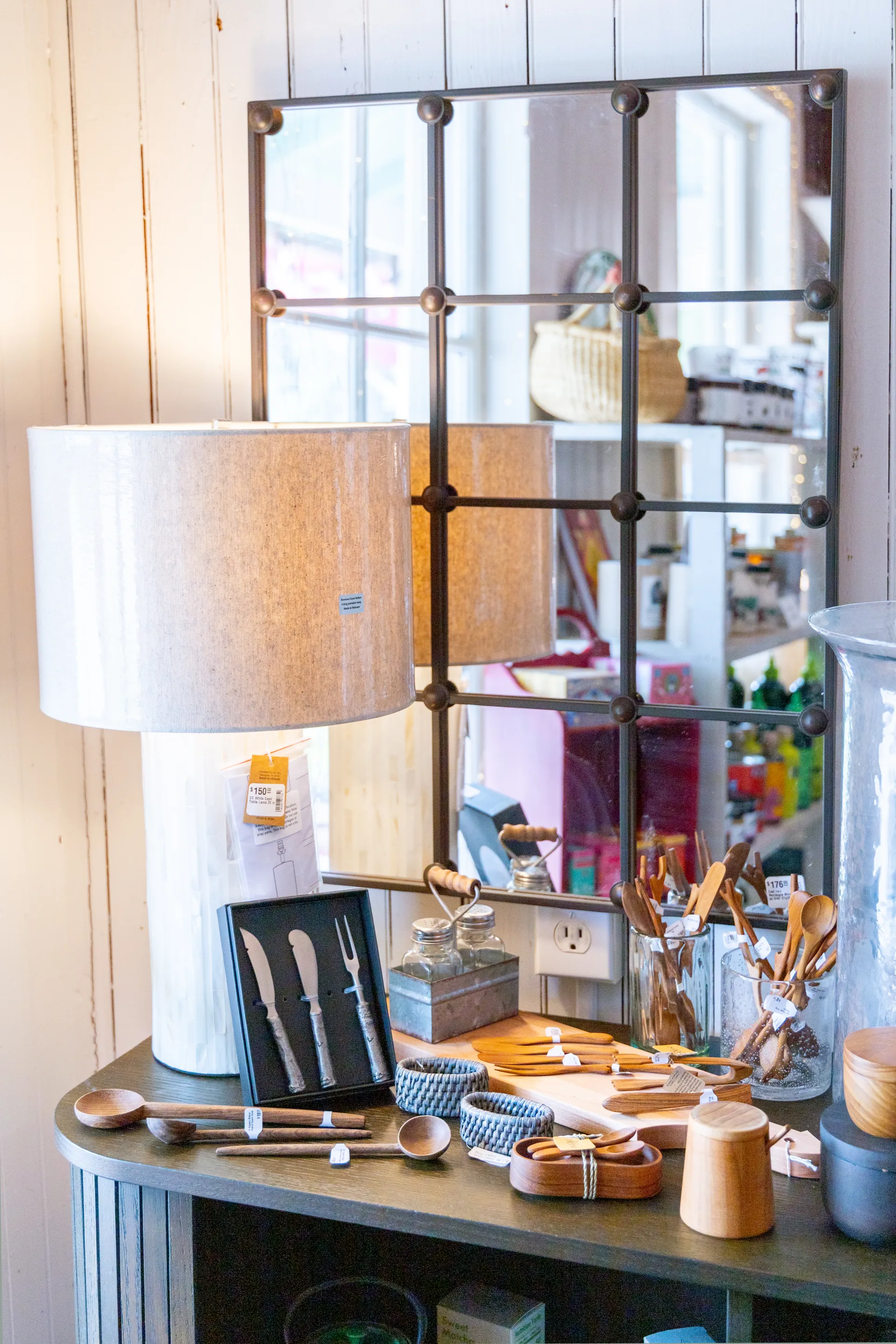 Various cutlery and serving wares on display