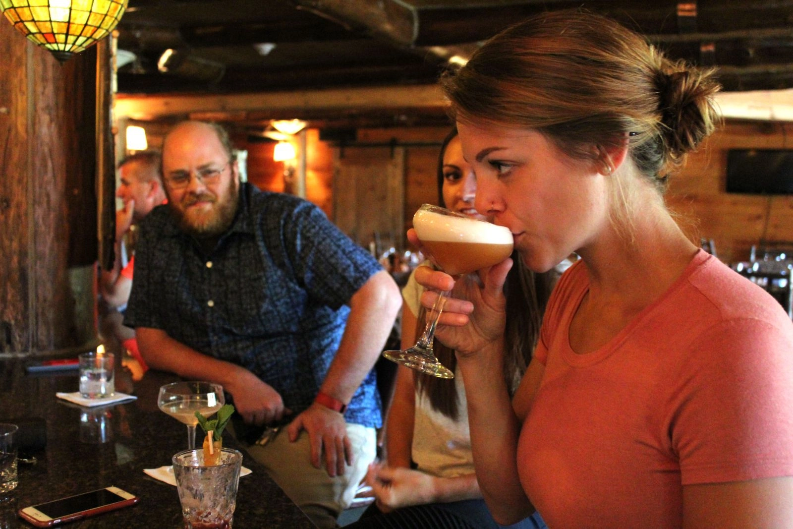 Bethany sips autumn in a glass.