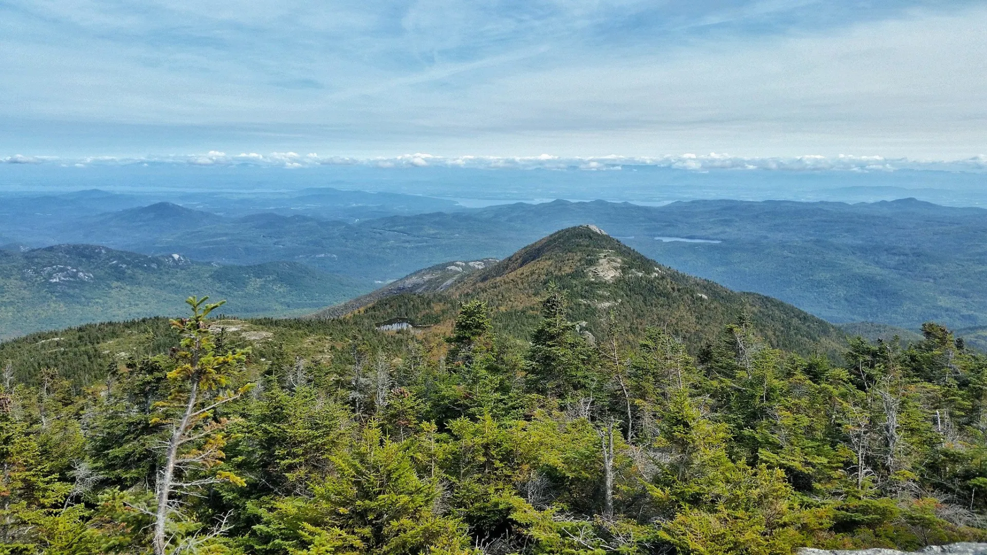 The view of a pointy mountain from above