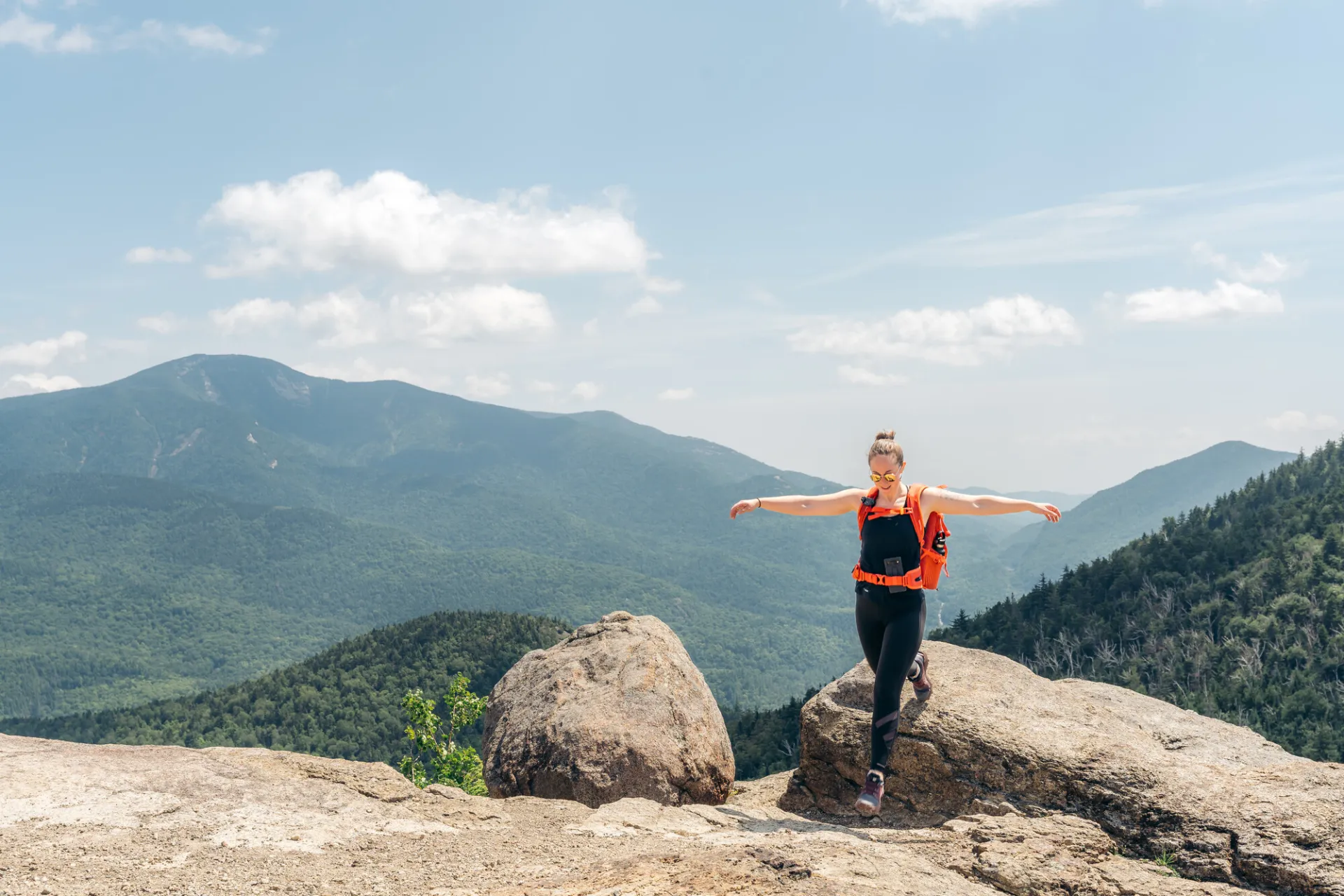 A hiker on a rocky summit
