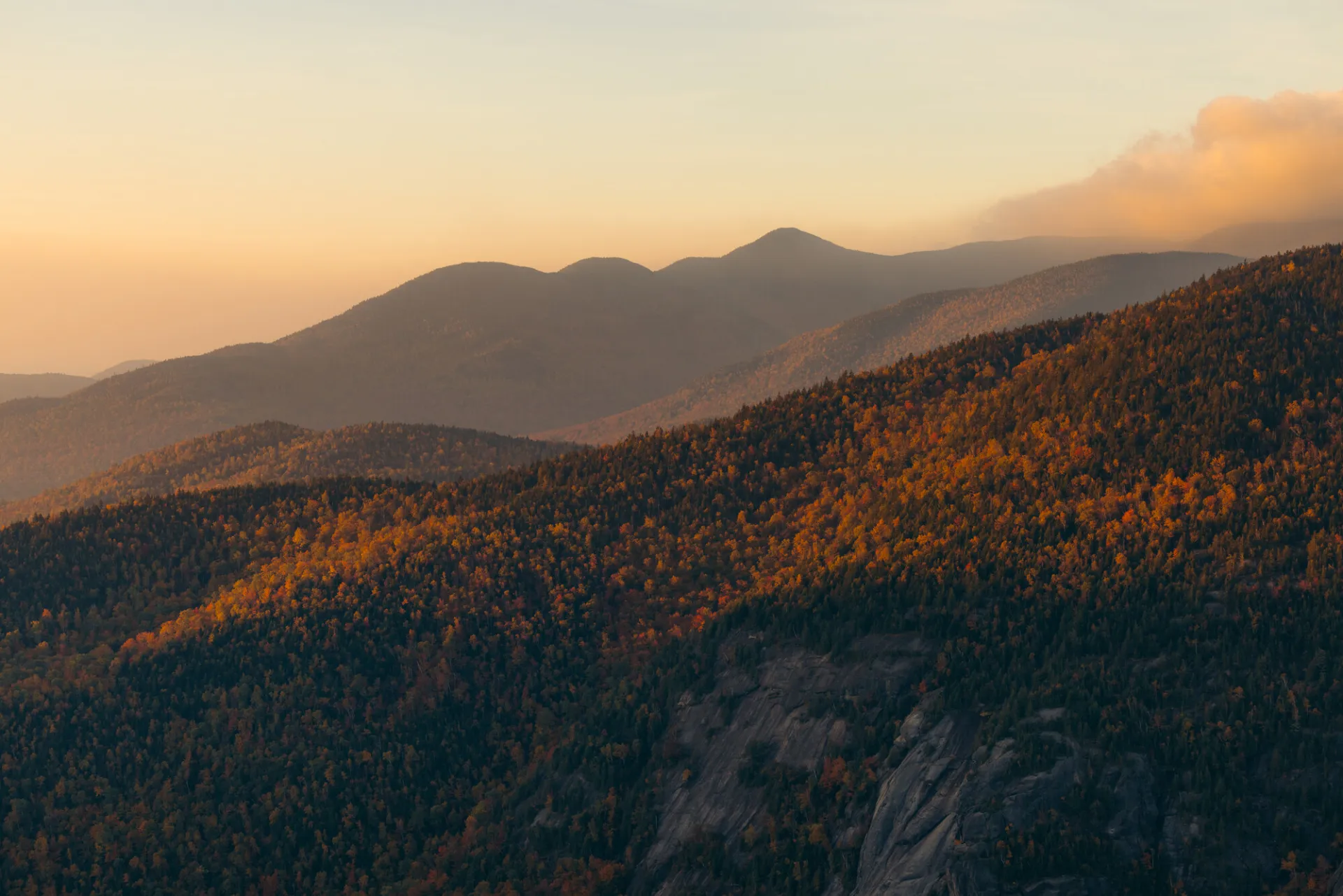 The view of tall mountains in the fall