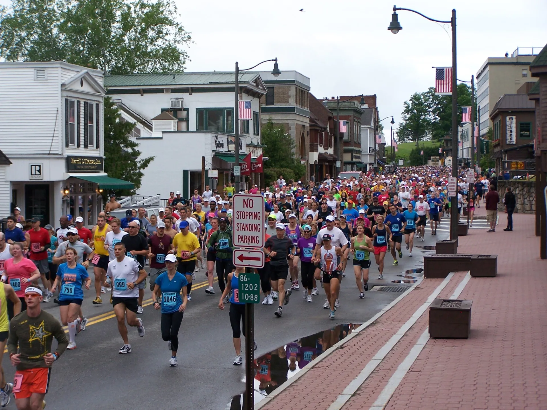 Lake Placid Main Street is packed with runners
