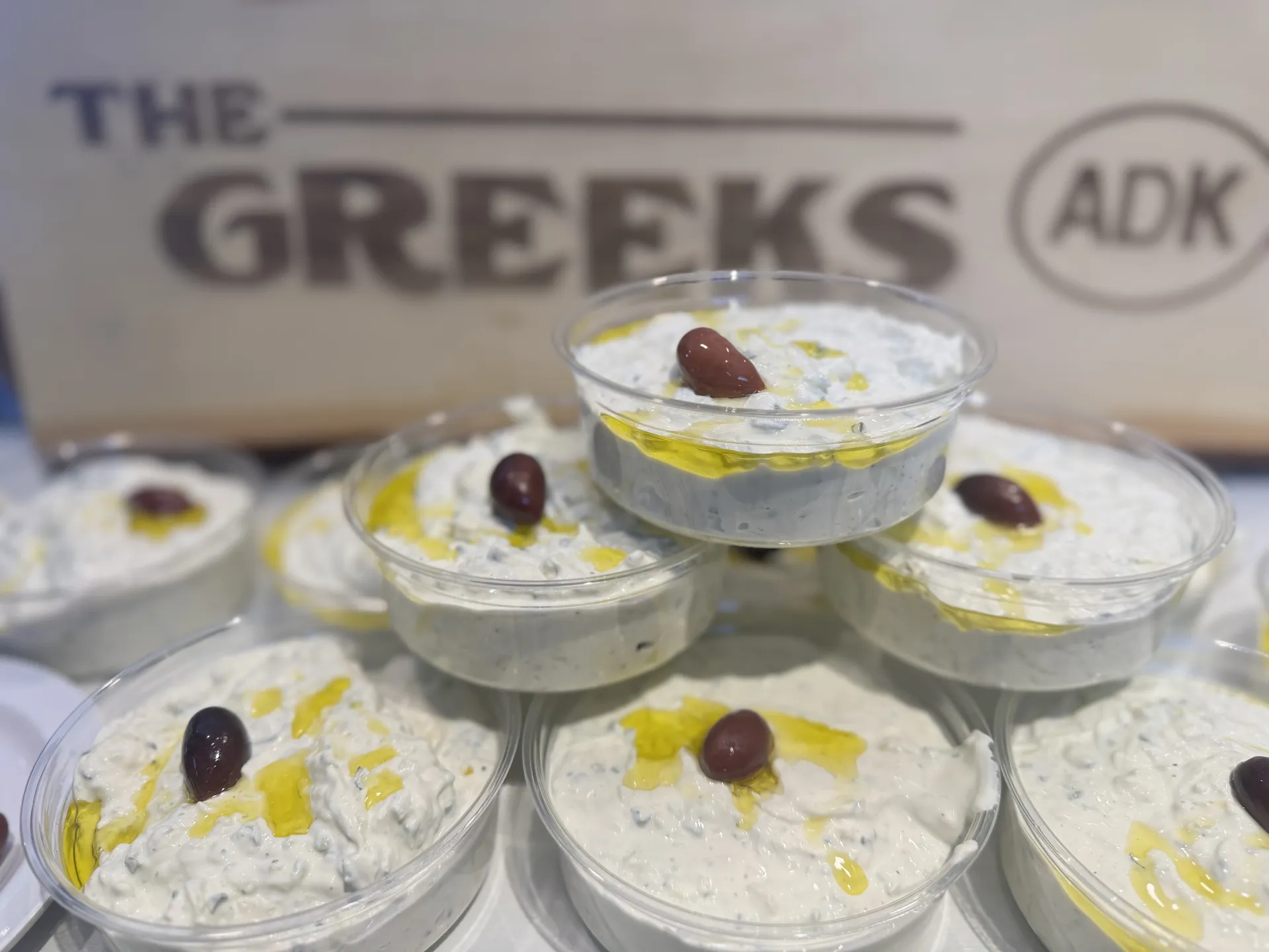 Tzatziki Spread: 
Yoghurt Based Dipping. Contains Garlic and Cucumber. Comes with 1 warm Pita Bread (Pita Not Gluten-Free).