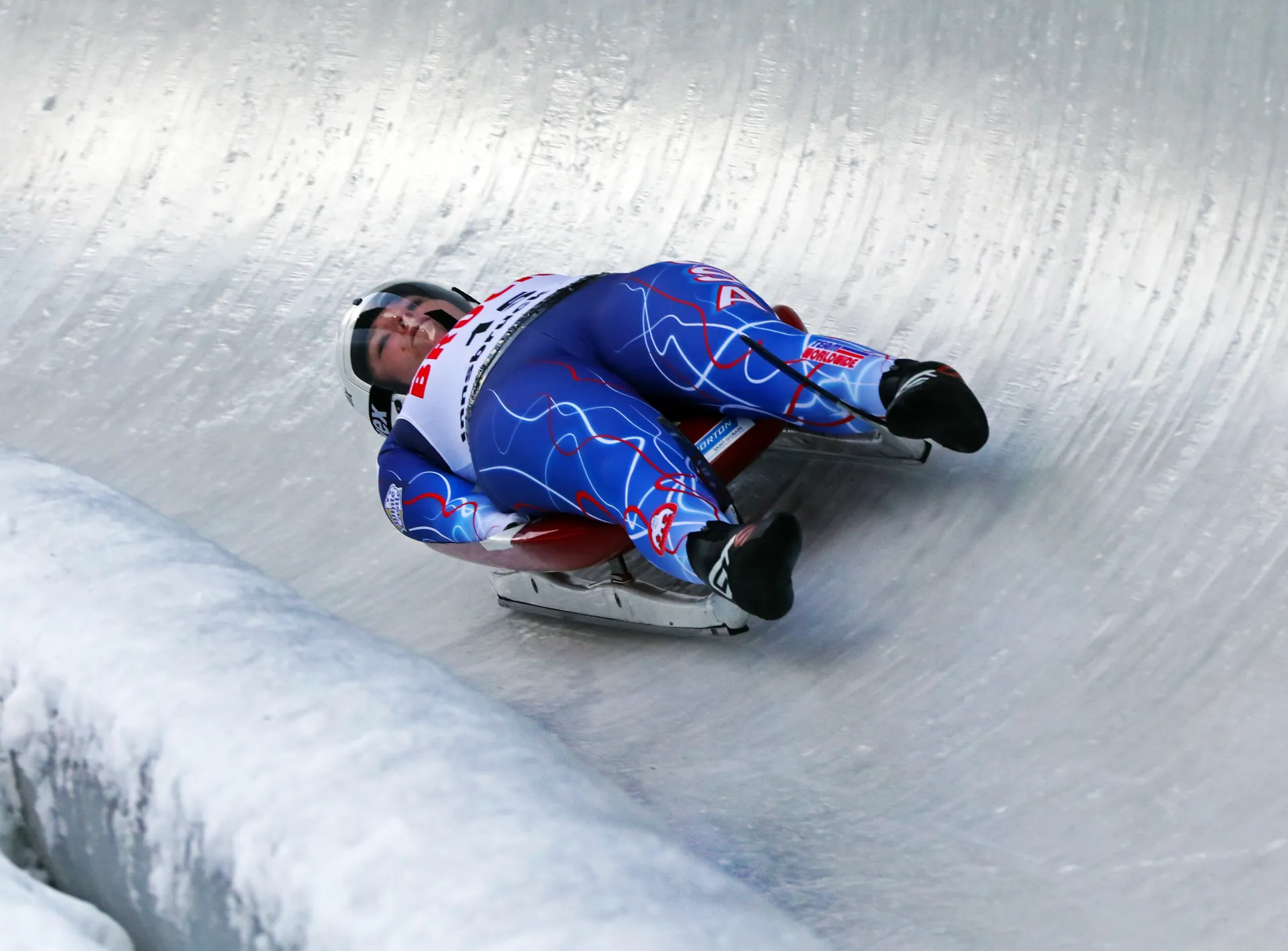 Ashley races down the luge track at the Jr. World Championship